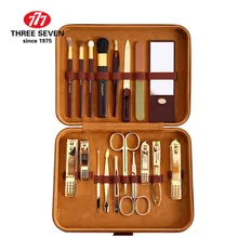 Три семь 777 Высокое качество углеродистая сталь золотой маникюрный набор машинка для стрижки ногтей Педикюр Макияж Инструменты 18 в 1 роскошный набор NTS-2015G