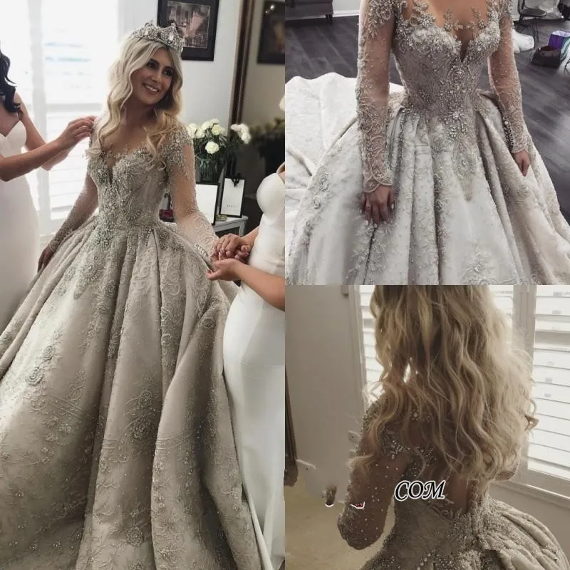 Gorgeous 2019 Lace Kralen Bruidsjurken Volledige Mouwen Crystal Puffy Dubai Crystal Bridal Jurken Vintage Bruidsjurken Gorgeous 2019 Lace Kralen Bruidsjurken Volledige Mouwen Crystal Puffy Dubai Crystal Bridal Jurken Vintage Bruidsjurken