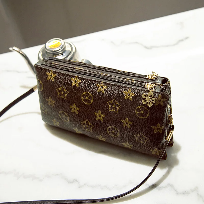 

2019 new clutch bag Europe and the United States long zipper bag women's shoulder diagonal cross bag double zipper retro wallet