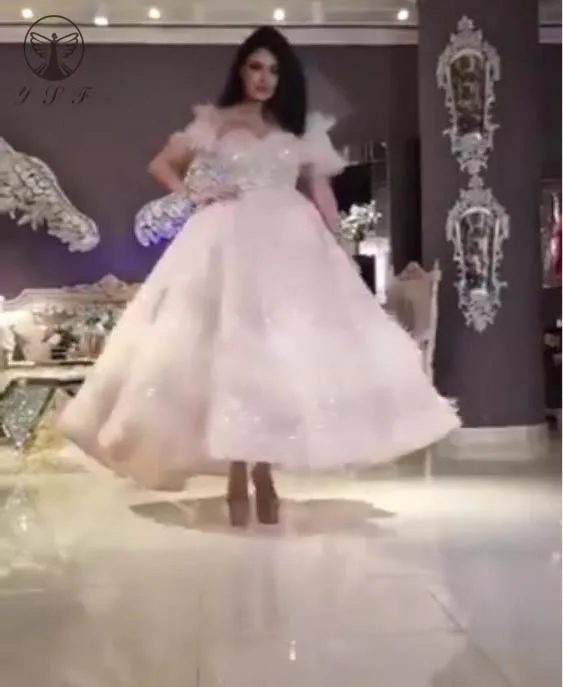 

New Arrival Off the Shoulder Beaded Stones Sequins Short Sleeve Feather Short Front Long Back Tea Length Prom Dresses