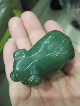 

Hand carved natural Dongling jade pig