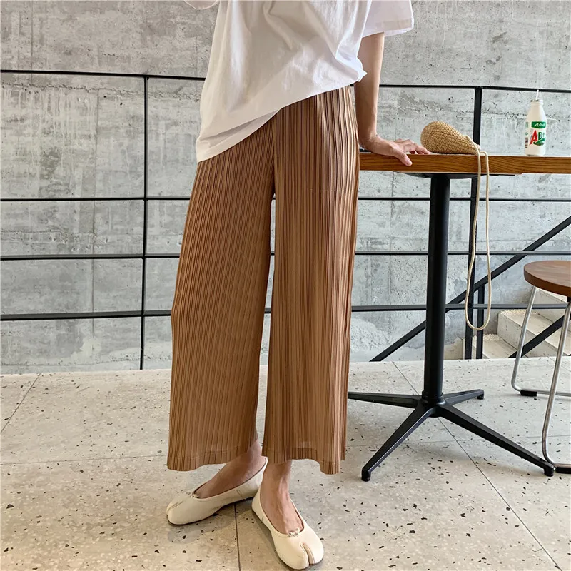 Miyake's loose slim wrinkled wide-legged pants and nine-minute pants free shipping
