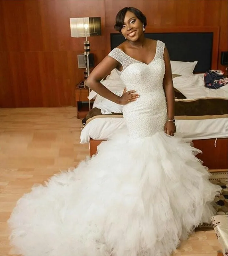 

2020 African Plus Size Mermaid Wedding Dresses V Neck Bling Beaded Tiered Ruffles Wedding Gowns Chapel Train Bridal Dress