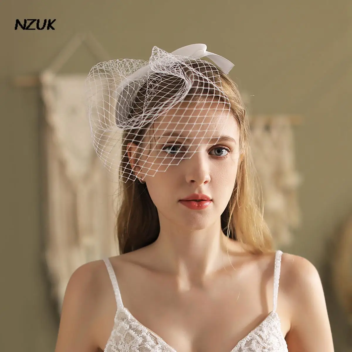 https://ae01.alicdn.com/kf/H6a7791b2f31341f794bd10ada1151c5dG/NZUK-Short-Veil-Women-Hair-Ornaments-Butterfly-Shape-Blusher-Veils-With-Combs-birdcage-veil-One-Layer.jpg