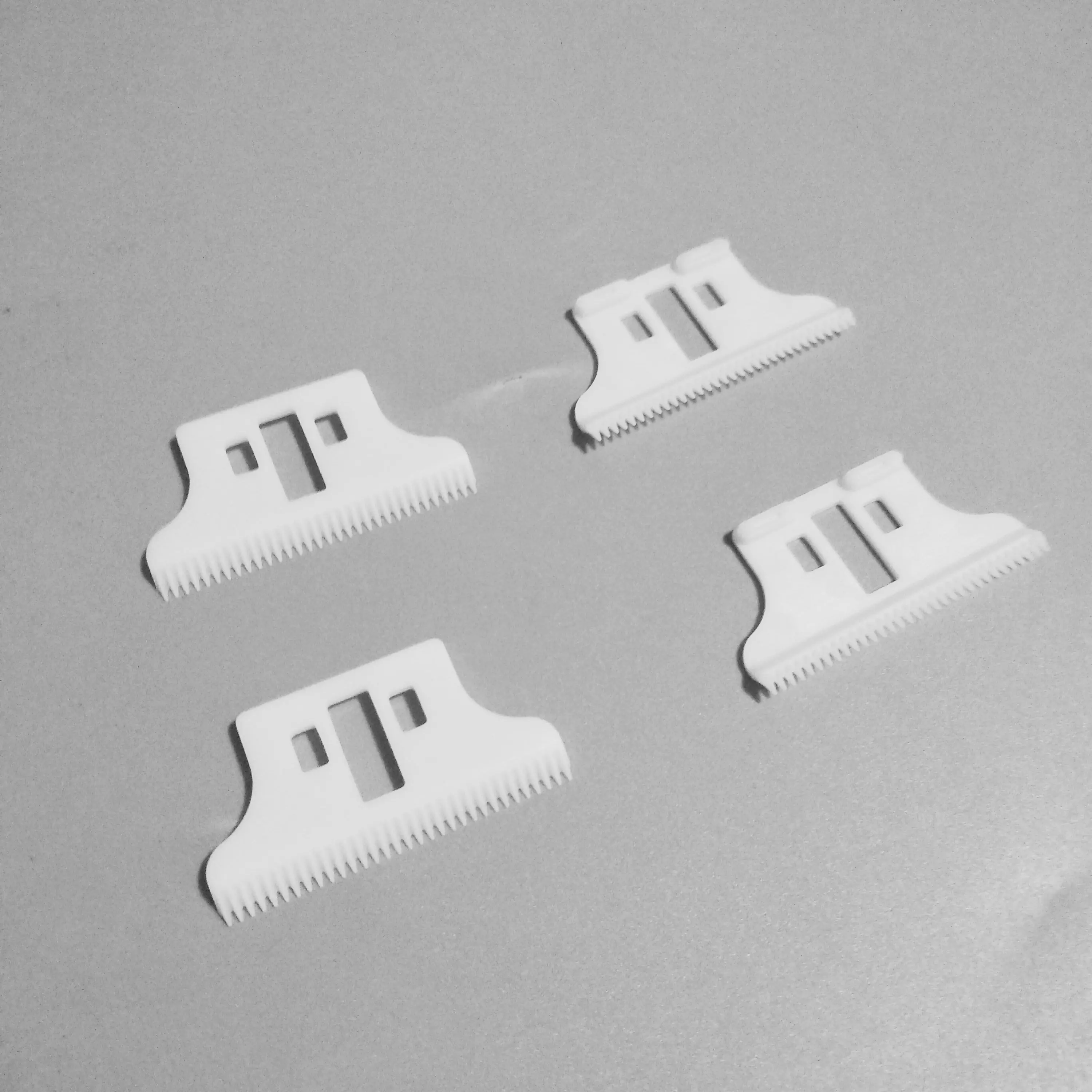 

Free shipping 50pcs 32 teeth zirconia ceramic blade cutter for wahl 8081 timmer