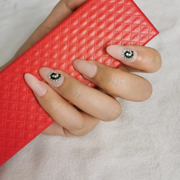 

False nails long oval candy fake nails acrylic nails green transparent rhinestones composed of gyro-shaped handmade nails