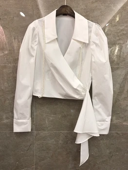 

2020 Autumn and Winter new women's lapel V-neck knitted stitching long sleeve solid color short jacket 920