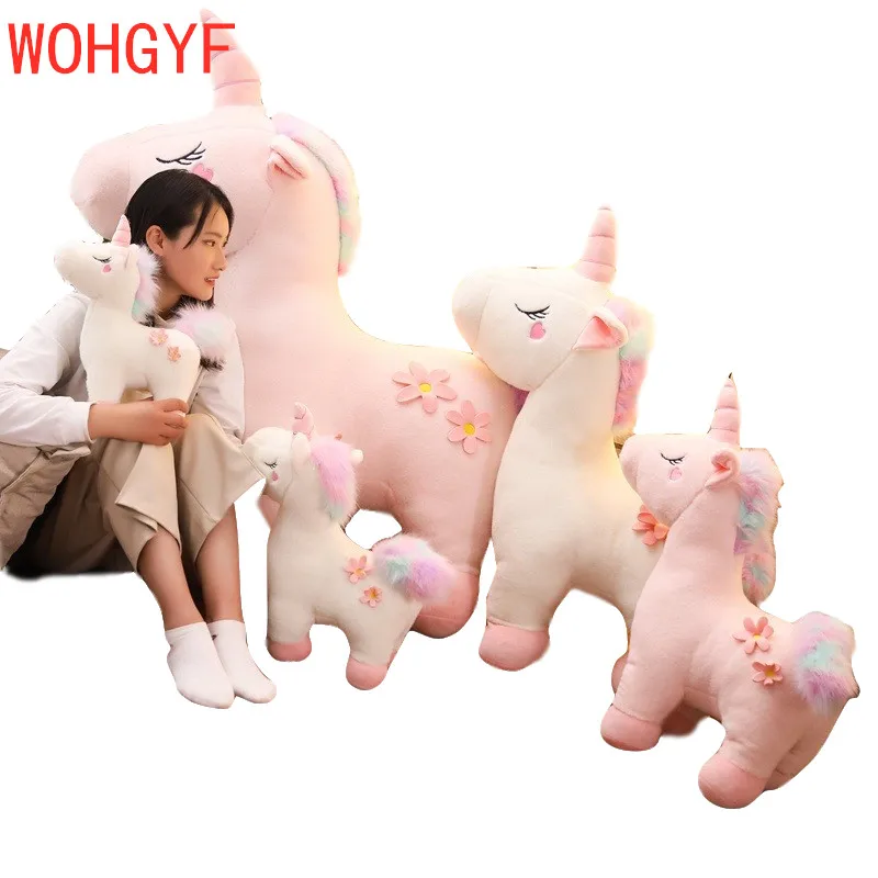 giant stuffed pink unicorn