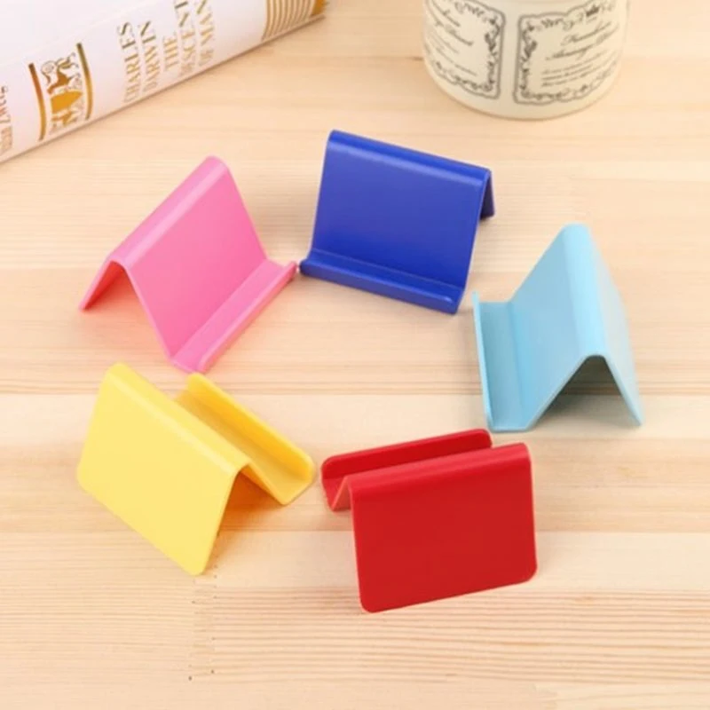 Universal Smart Phone Holder Portable Candy Colors Stand Fixed Holder For IPhone Samsung Huawei Color Random Phone Accessories phone stand for desk