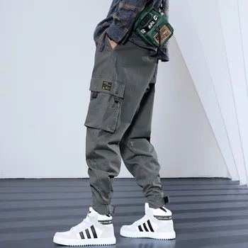 

Fashion Streetwear Men Jeans Loose Fit Big Pocket Cargo Pants Elastic Waist Harem Trousers Camouflage Military Hip Hop Pants Men