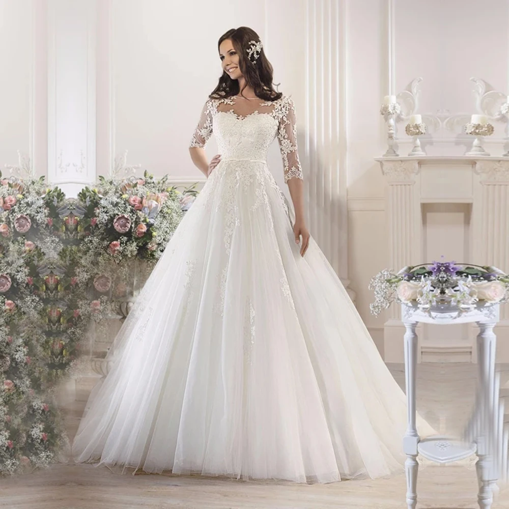 

Half Sleeves Lace Appliques Puffy Tulle A Line Wedding Dress Plus Size Illusion Tulle Buttons Back Bridal Gown Robe De Marriage