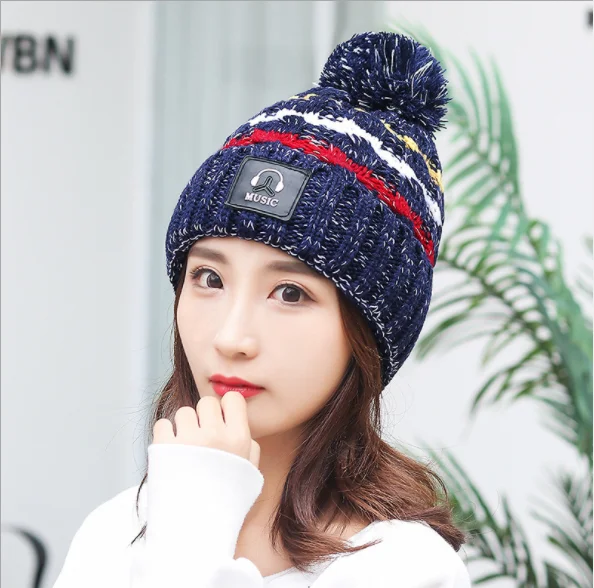 

Korean mixed color leather label headphone knitted cap with fleece warm lady hat autumn and winter wool hat ball lovely and beau