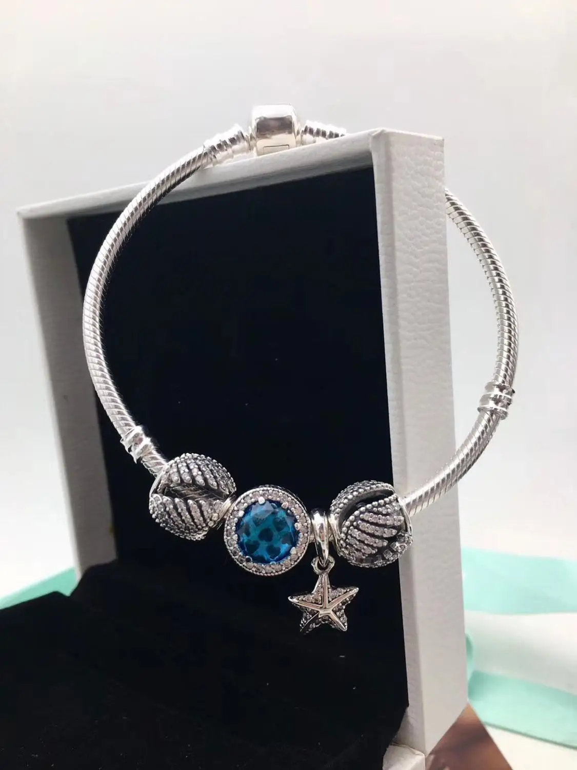 

High Quality Blue Gemstone Star Pendant Set in Sterling Silver with Original Logo Jewelry and Free Shipping.