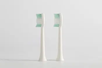 

2020 2pcs U-Kiss Electric Toothbrush Head Angled Neck and Contoured Bristles for Comfortable Use Easy Replacement and Cleaning