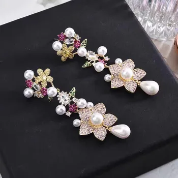 

Direct selling Korean version heavy industry micro zircon inlaid flower shell pearl light luxury earrings with all kinds of exqu