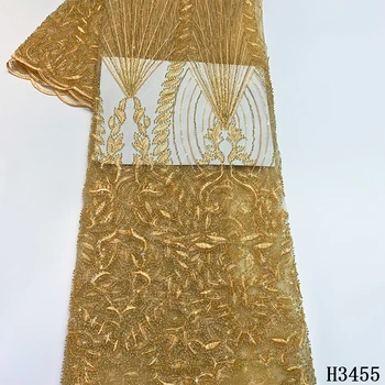 

Gold Latest 2020 lace fabrics Handmade Heavy Beaded lace fabric French Net Lace Fabric with Sequins for Wedding Dress HJ3455