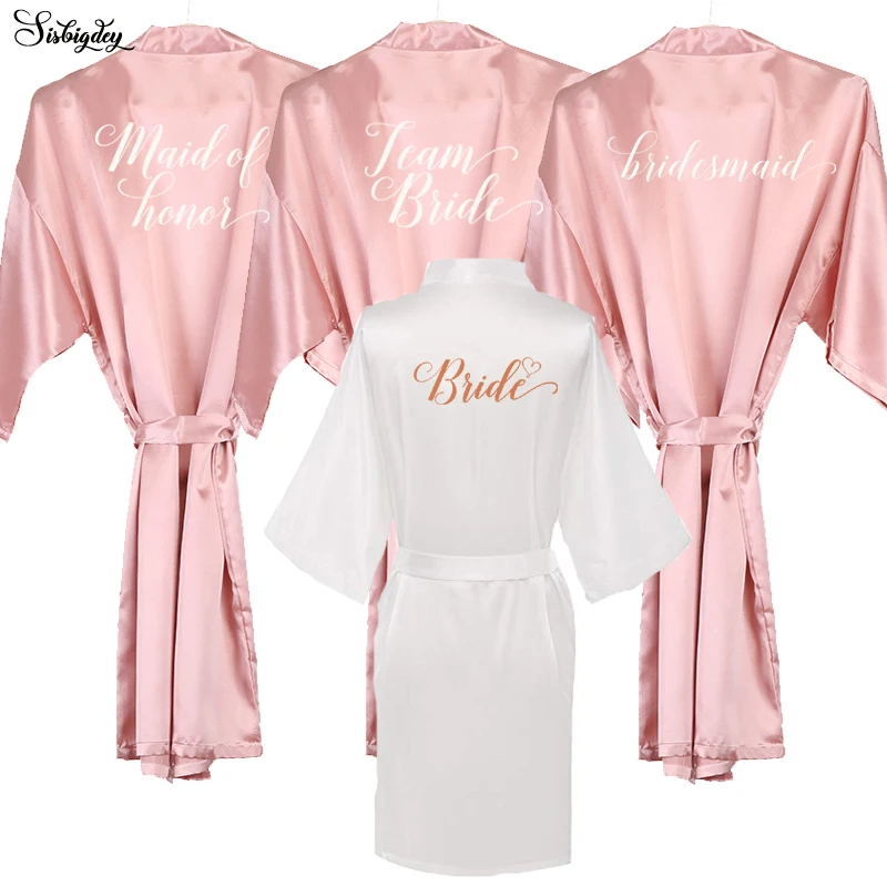 

dark blush pink bride satin robe women pajamas rose gold white writing wedding bridesmaid gift sister in law team bride robes