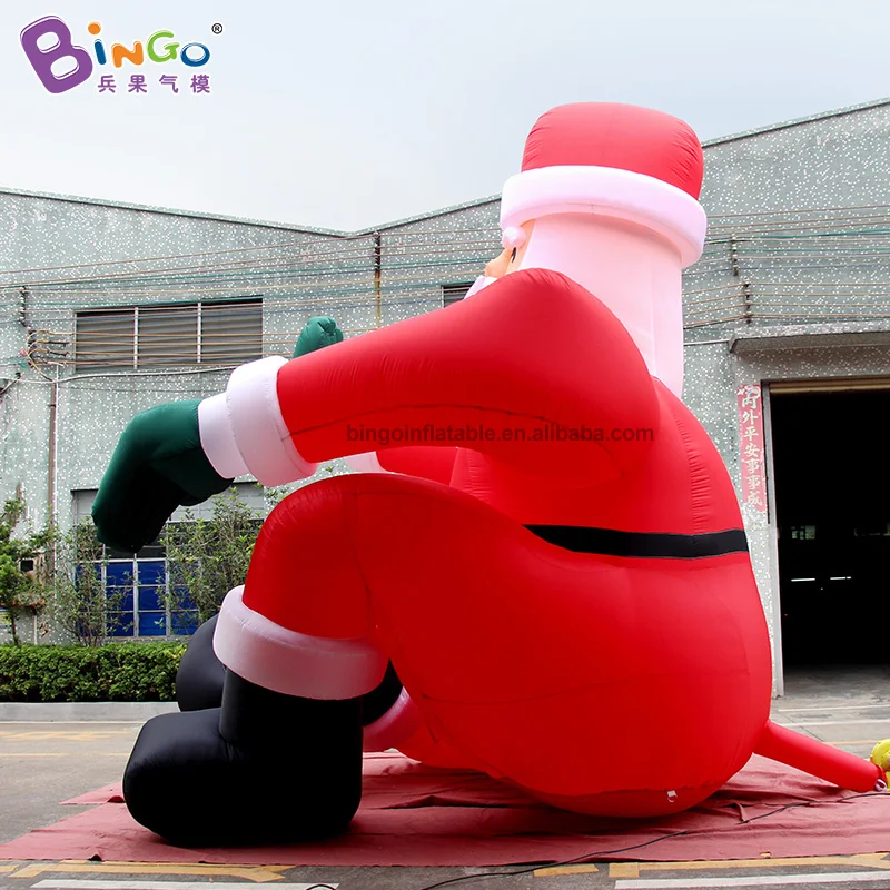Custom Made 5m inflatable big Santa with green glove model waving figure lovely decoration for christmas display toy