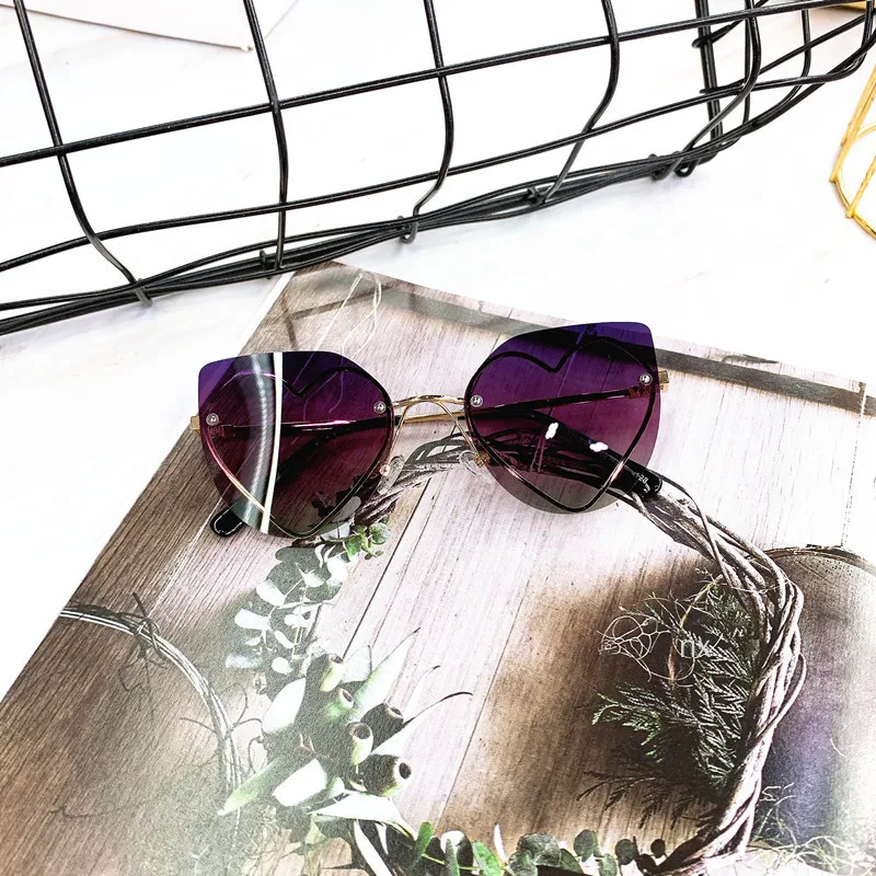MINCL Brand Rimless Heart Sunglasses For Women Fashion Ladies Sun Glasses Love Heart Shaped Candy Glasses Girls UV400 NX - Цвет линз: purple