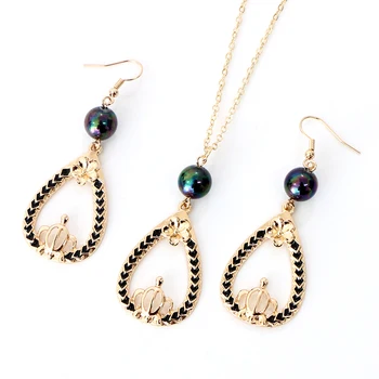 

Say Hello Polynesian Hawaiian Samoa Marshall Glass Bead Pearl Crown Flower Black Enamel Borders Necklace Earrings Jewelry Set