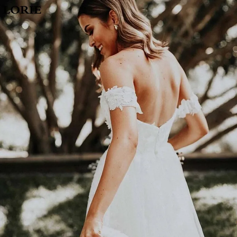graceful-lace-appliques-off-shoulder-wedding-dresses-backless-tulle-a-line-boho-beach-plus-size-wedding-gowns-robes-de-mariée (2)