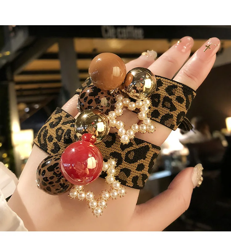 US $119.00 60pcslot DIY Simple Multi Fabrics Pentagram Leopard Rubber Band Elasticity Pearl Hair Bands Styling Tools Accessories HA1634