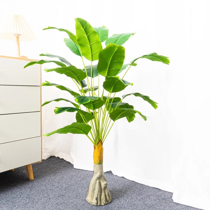 Introducing the 100cm 24 Heads Artificial Banana Tree. A perfect fusion of beauty and durability, this decorative piece will transport you straight to the tropical rainforests every time you glance its way. • Colma.do™ • 2023 •