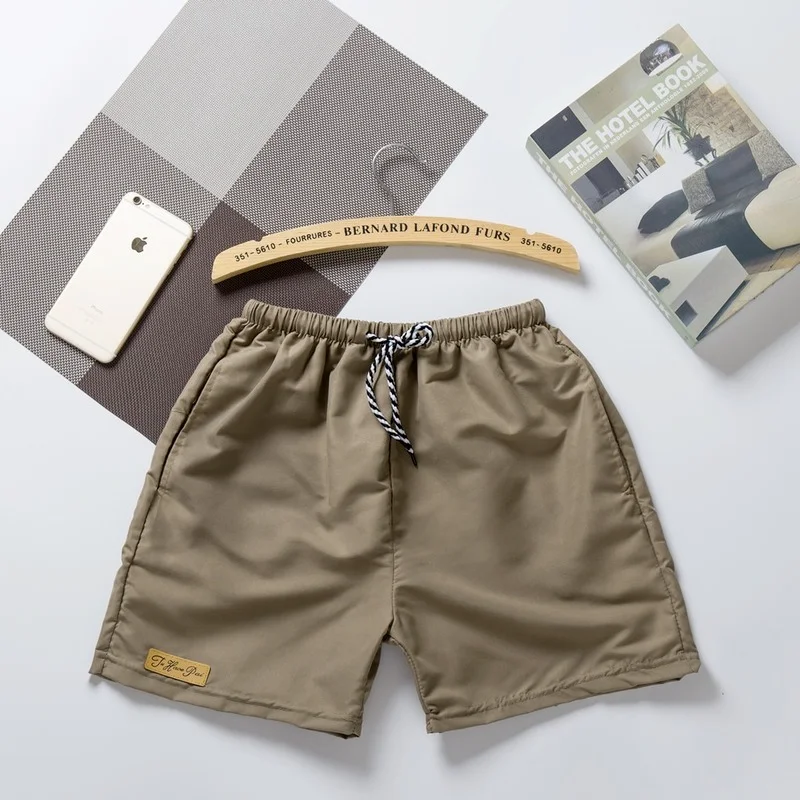 ICCLEK New Men's Summer Couple Three-point Pants Beach Pants Candy Color Casual Pants Sports Shorts Hot Pants Trend