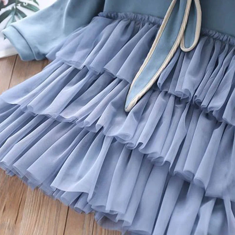 autumn new medium and small children's solid color hooded bow tie long-sleeved stitching cake mesh dress