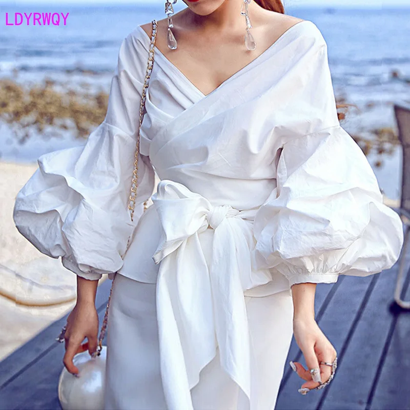 

2019 autumn and winter new women's European and American style sexy V-neck fashion puff sleeves with bow slim shirt