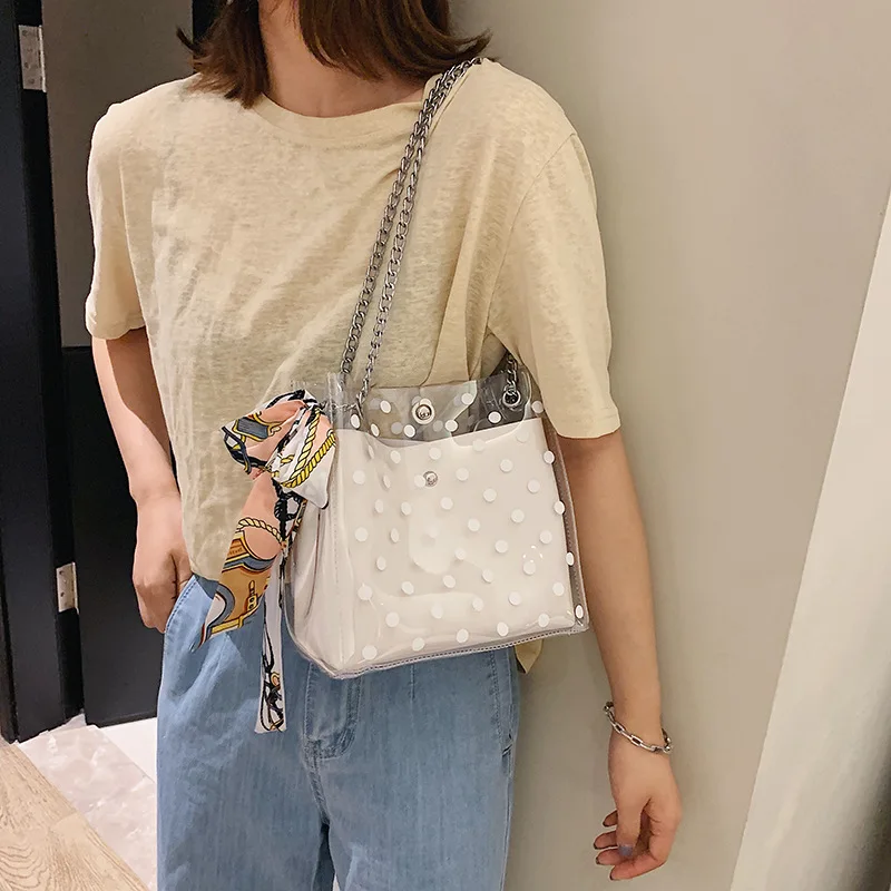 

The new woman 2019 new wave point silk scarf chain single-shoulder wrap gas with transparent jelly small pack