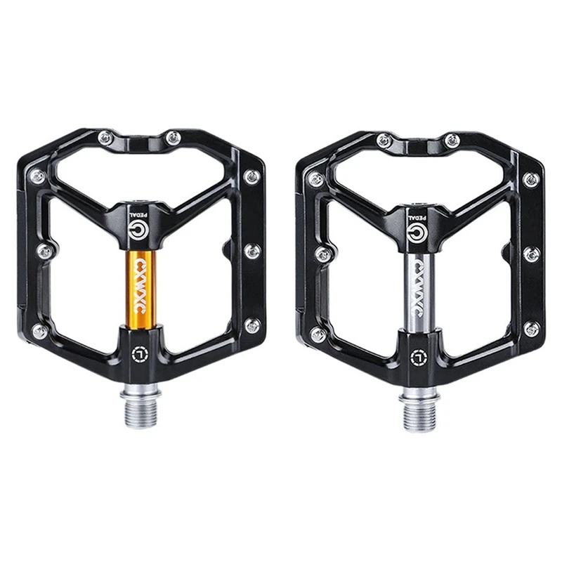 black and gold bike pedals
