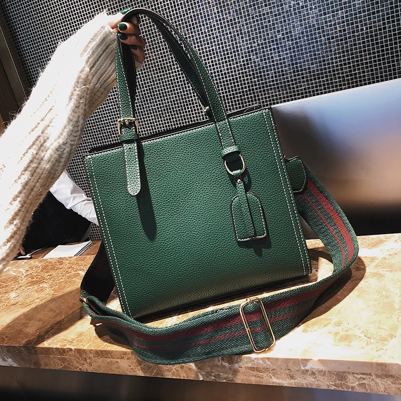 

2019 New stereoscopic large square bag pendant striped wide shoulder belt single shoulder oblique span women's bag