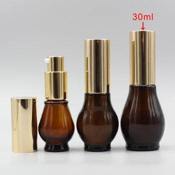 

Empty 30ml Amber Oil Essential Bottle With Gold/Black Lotion Pump