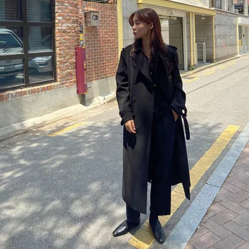 

Autumn and winter women's windbreaker casual solid color lapel long sleeve double breasted belt decoration long windbreaker