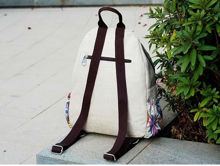 Fashion national string appliques women shopping backpacks!Nice floral embossing lady hasp backrack All-match Canvas backruck