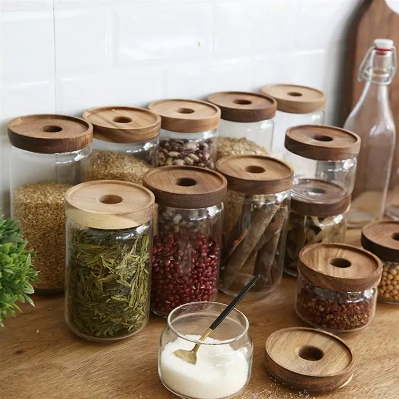clear storage jars with wooden lids