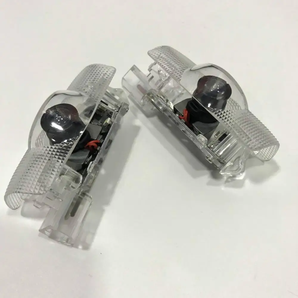 

JURUS 2PCS LED Car Door Logo Lights Welcome Logo Ghost Shadow Warning Light Laser Projector Lamp For Lexus RX300 IS250 LS LX ES