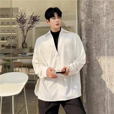 

Abstinence Department Spring false two black-and-white collision color stitching loose long-sleeved shirt fashion Korean version