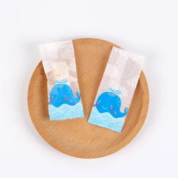 

100pcs Nougat Plastic Bag Cartoon Cute Whale Waves Clouds Decor Handmade Gift Candy Wrapper Baptism Sugar Machine Seal Packaging