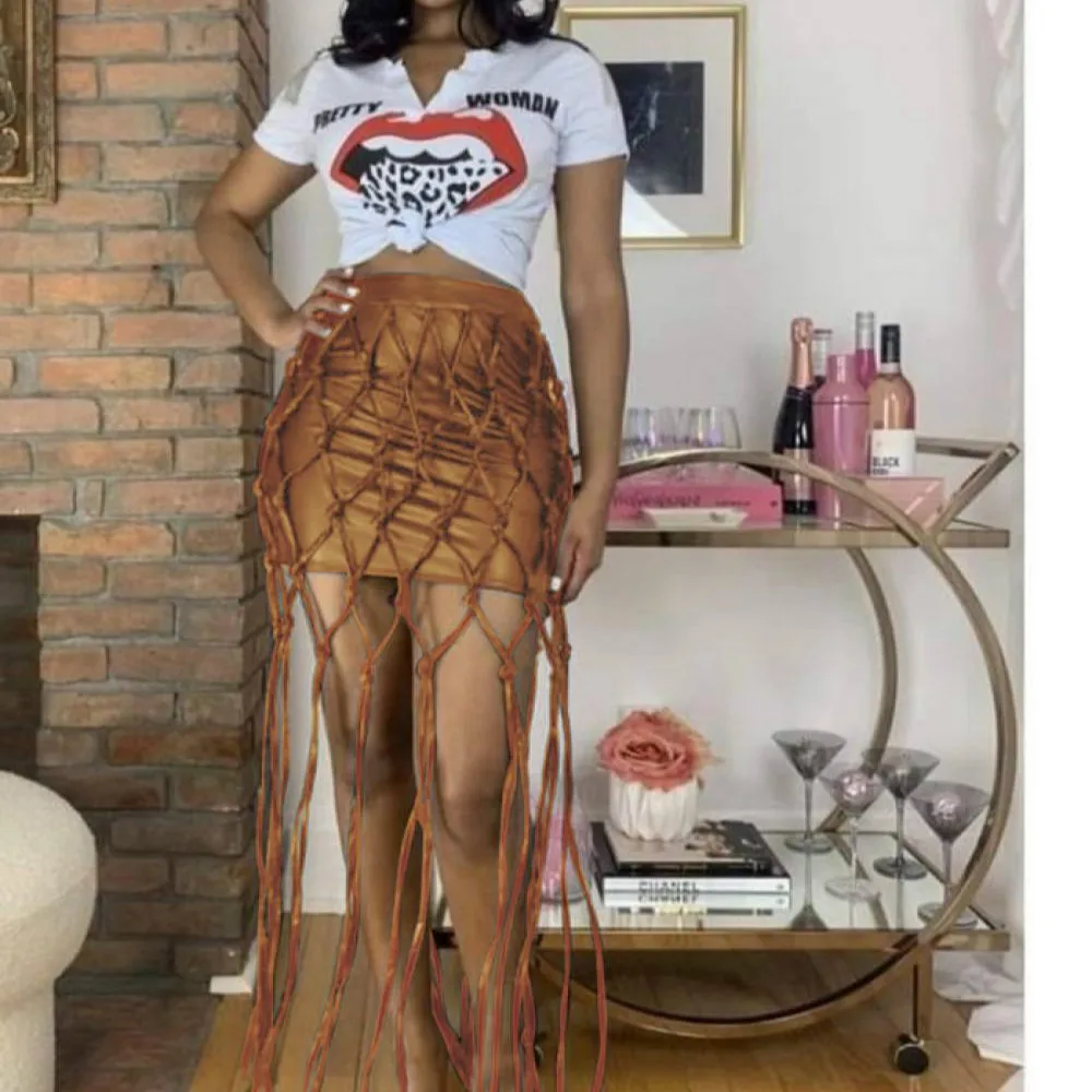 Falda corta de cuero Pu con flecos para mujer, falda de cuero tejido de malla, nalgas Sexy, novedad de 2021 - AliExpress Ropa de mujer