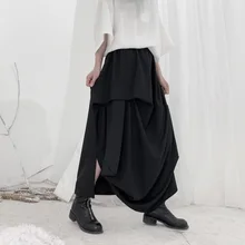 [] Высокая эластичная талия черная Асимметричная плиссированная темпераментная юбка средней длины Женская мода Новинка весна осень 19A-a652