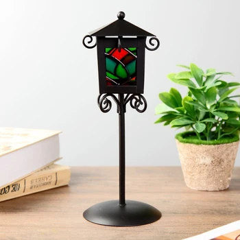 

Metal candlestick for 1 candle "Street lamp with stained glass" black 25x9.7x9.7 cm 3714089