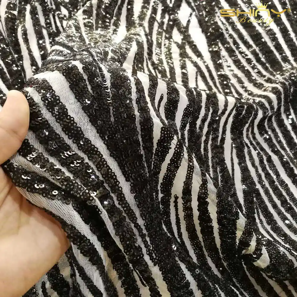 

Shiny Beauty 1 Yard Black To White Leaf Reversible Sequin Fabric For Tablecloth/Table Runner Background Material-M190807