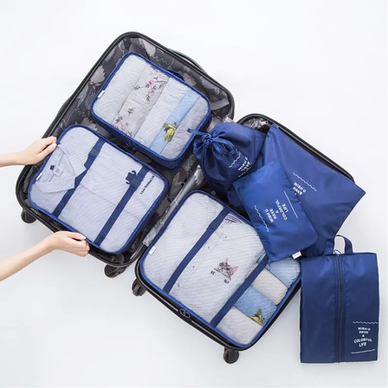 packing clothes in luggage