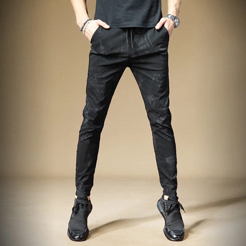 Новые мужские модные повседневные осенние мужские тонкие ноги спортивные брюки Мужская Корейская версия трендовых принтованных брюк