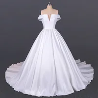 LSDZ29-White-Simple-Attractive-V-Neck-Short-Sleeve-Lace-Up-Back-Off-The-Shoulder-Wedding-Dress.png