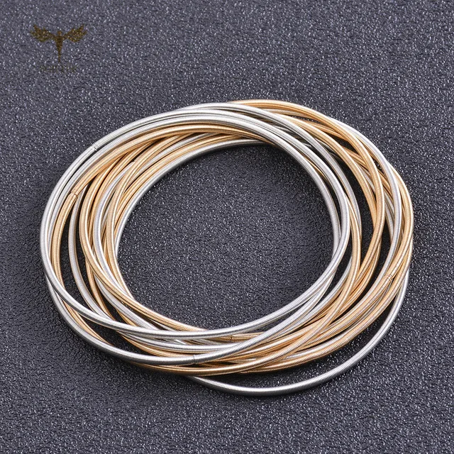 Amazon.com: Gold Guitar String Spring Bracelets Stainless Steel Stackable  Layered Set of 10 20 30 40 50 60 (Set of 20 Strings) : Handmade Products