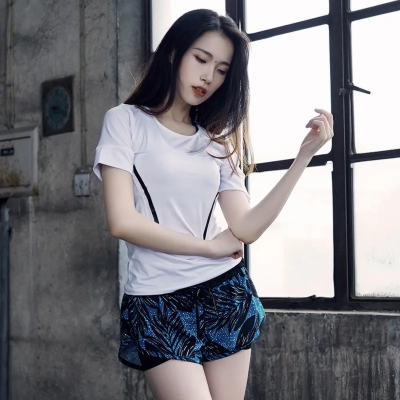 

2019 the new short-sleeved fitness elastic lady suit spliced mesh gauze sleeve trimmed round collar T-shirt woman