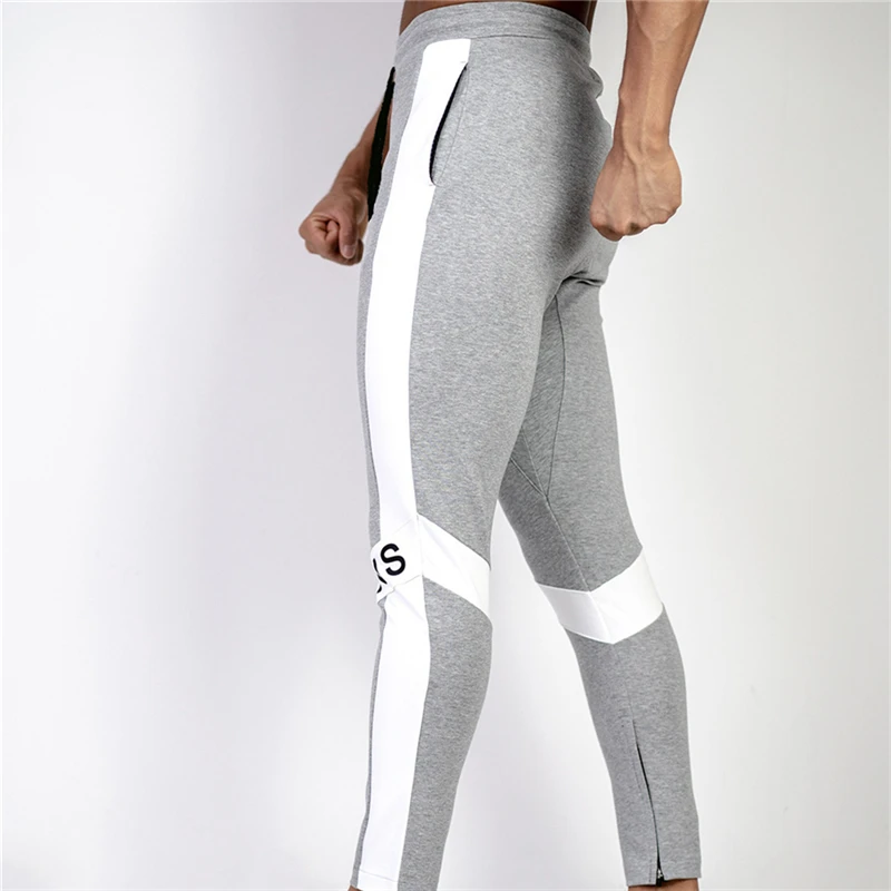 Повседневные спортивные брюки Мужские Jogger Спортивные штаны тренажеры фитнес тренировки Брендовые брюки мужские осенние модные хлопковые спортивные штаны